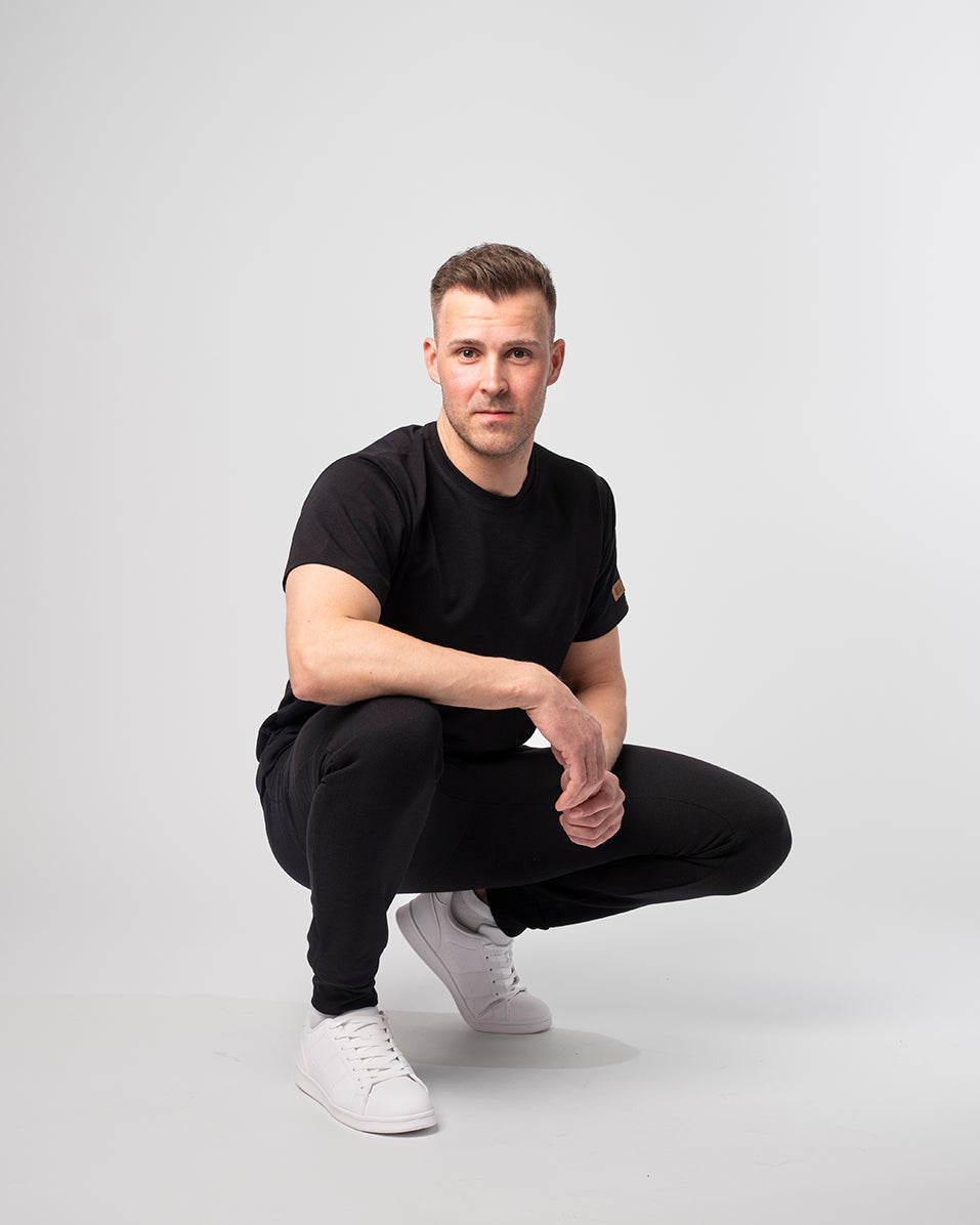 Miesten collegehousut musta - miellyttävät ja joustavat housut